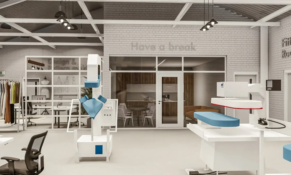 Design and pattern making workspace by Studio Hatch at the Belma Tvico Production Area, featuring modern tools and fashion sketches.
