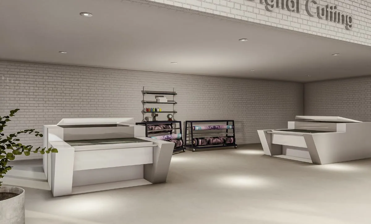 Belma Tvico production area featuring digital cutting machines for fashion production.