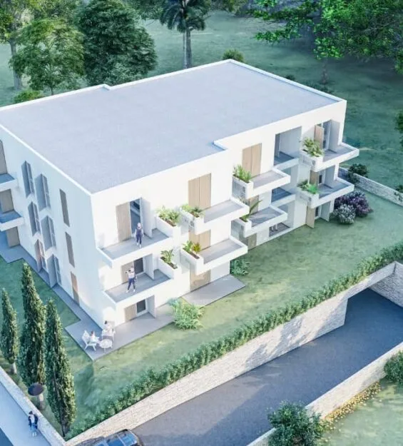 Aerial view of the modern two-story residential building in Orebić, Croatia, designed by Studio Hatch, showcasing balconies and an underground garage.