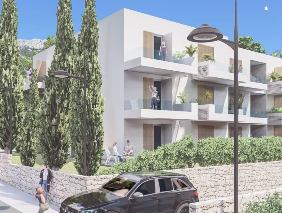 Street-level view of a two-story residential building with balconies, designed by Studio Hatch in Orebić, Croatia.