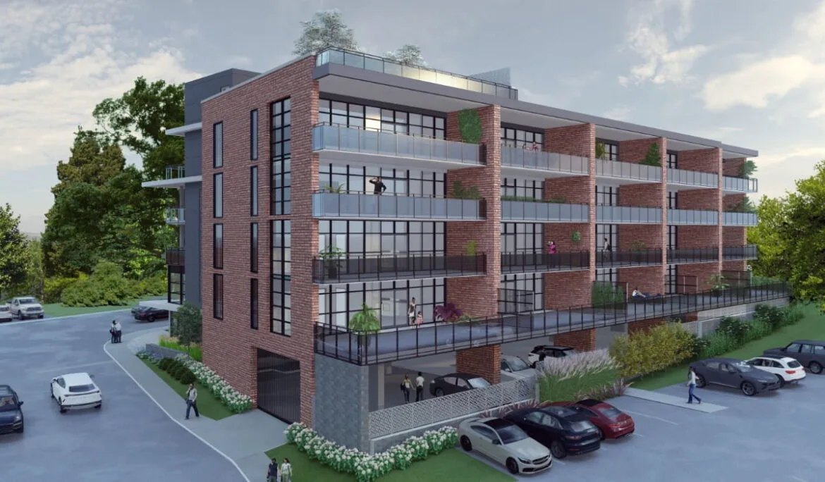 Rear view of Picton Harbor Lofts designed by Studio Hatch, featuring modern architecture with glass balconies overlooking Picton Harbor